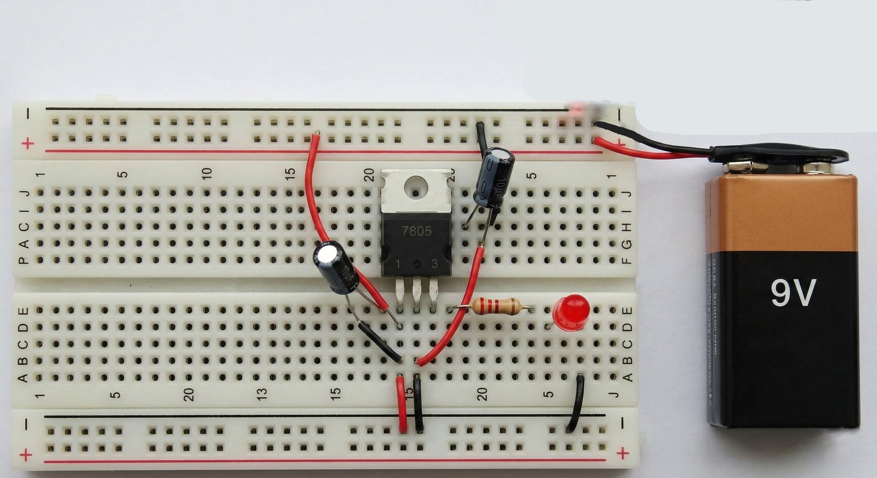 Breadboard layout of 7805 voltage regulator circuit
